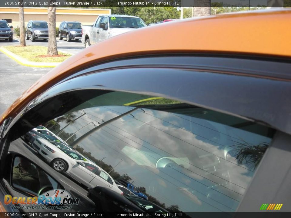 2006 Saturn ION 3 Quad Coupe Fusion Orange / Black Photo #6