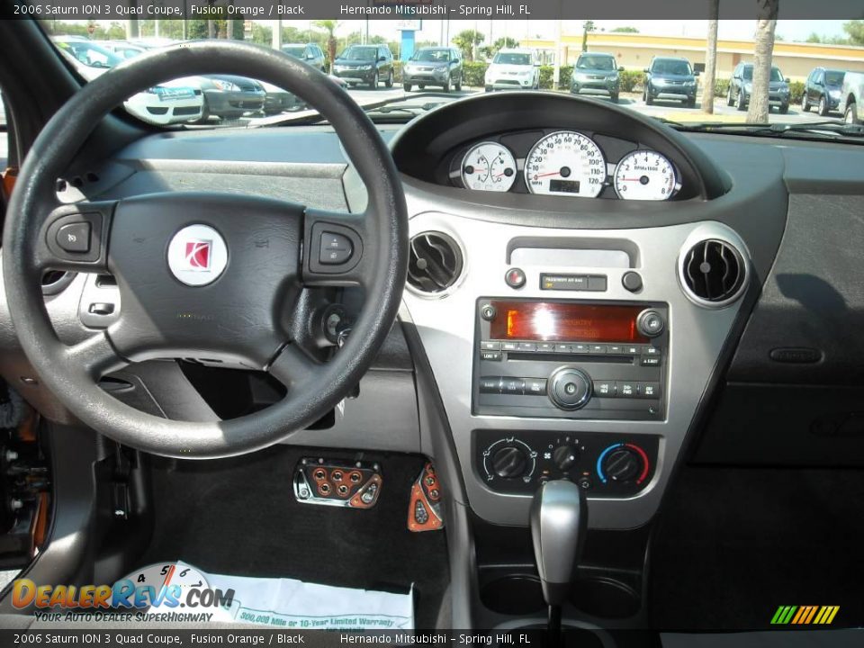 2006 Saturn ION 3 Quad Coupe Fusion Orange / Black Photo #8