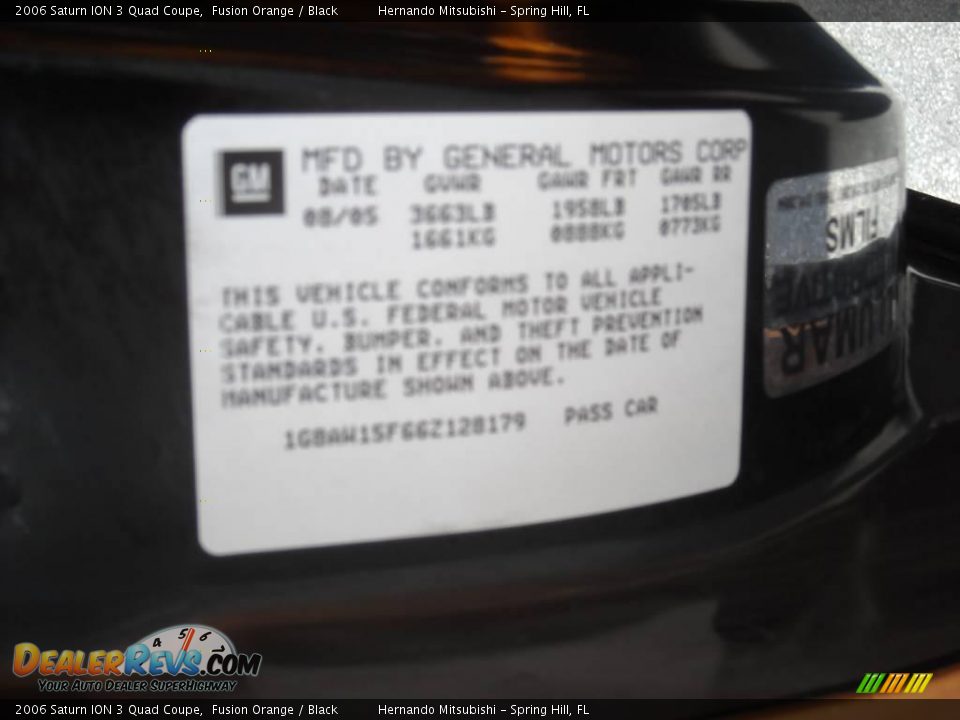 2006 Saturn ION 3 Quad Coupe Fusion Orange / Black Photo #34