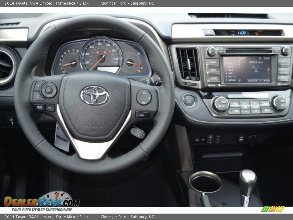 Dashboard of 2014 Toyota RAV4 Limited Photo #12
