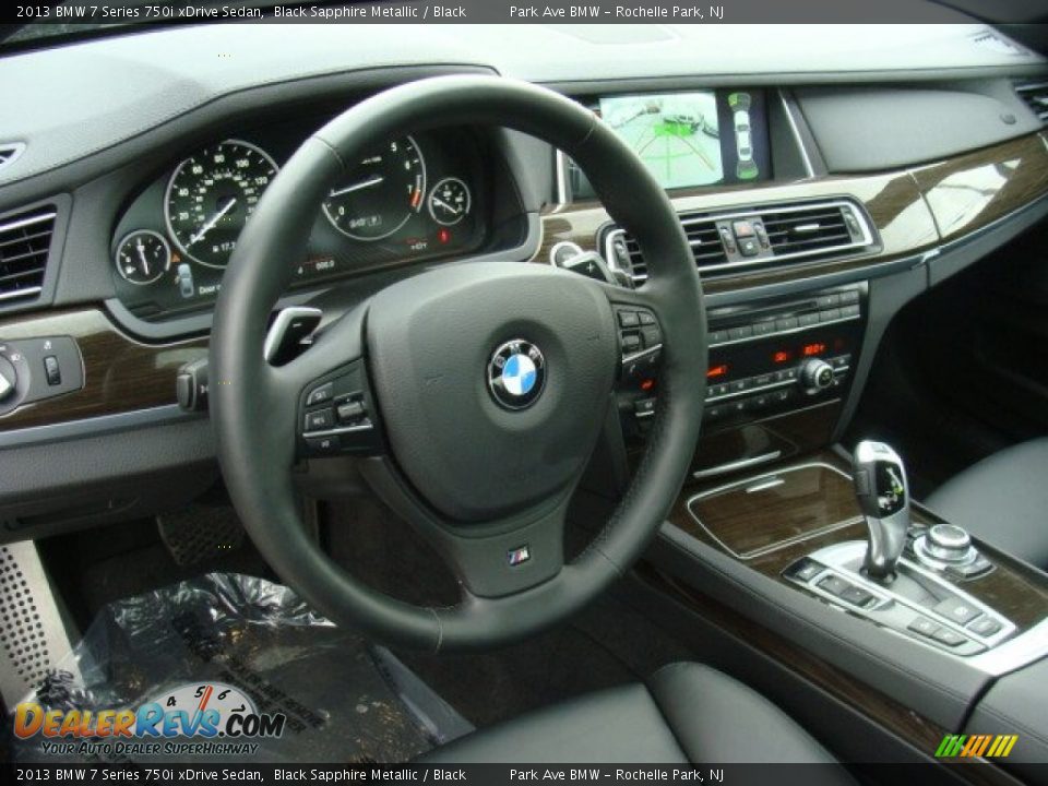Dashboard of 2013 BMW 7 Series 750i xDrive Sedan Photo #10