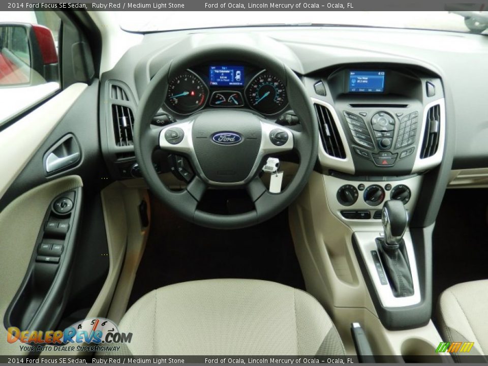 2014 Ford Focus SE Sedan Ruby Red / Medium Light Stone Photo #8