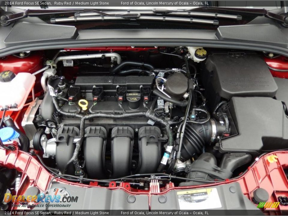 2014 Ford Focus SE Sedan Ruby Red / Medium Light Stone Photo #11
