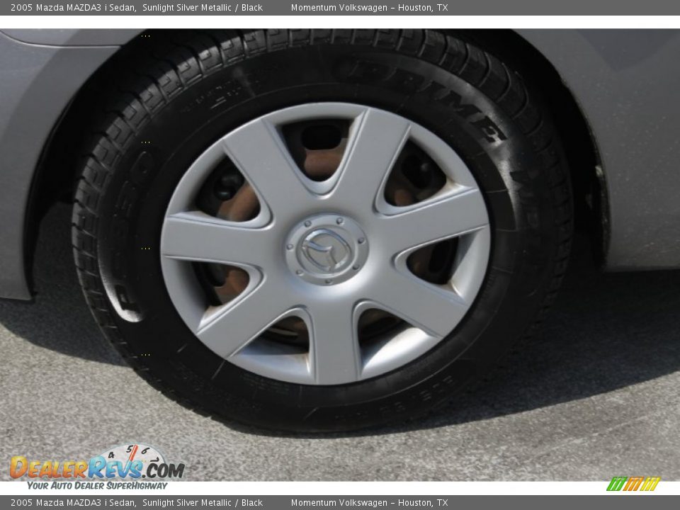 2005 Mazda MAZDA3 i Sedan Sunlight Silver Metallic / Black Photo #4