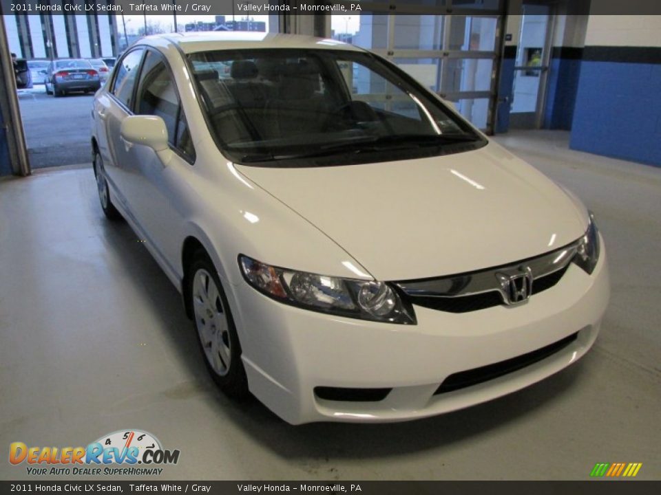 Front 3/4 View of 2011 Honda Civic LX Sedan Photo #6