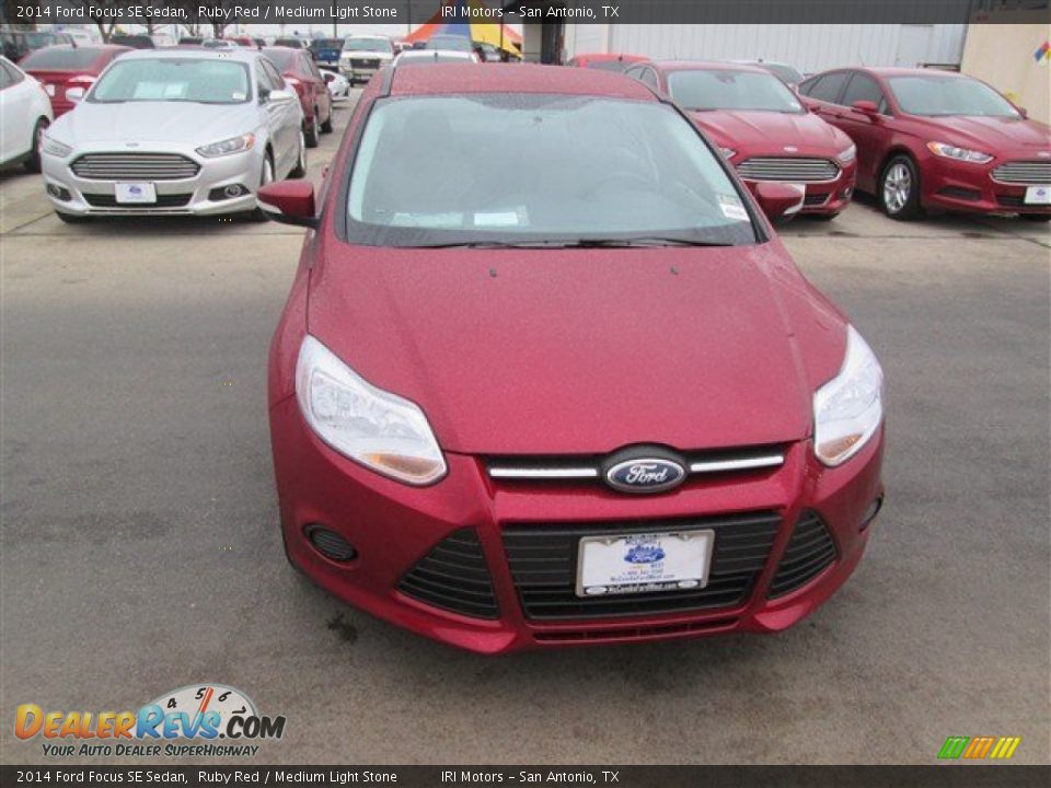 2014 Ford Focus SE Sedan Ruby Red / Medium Light Stone Photo #1