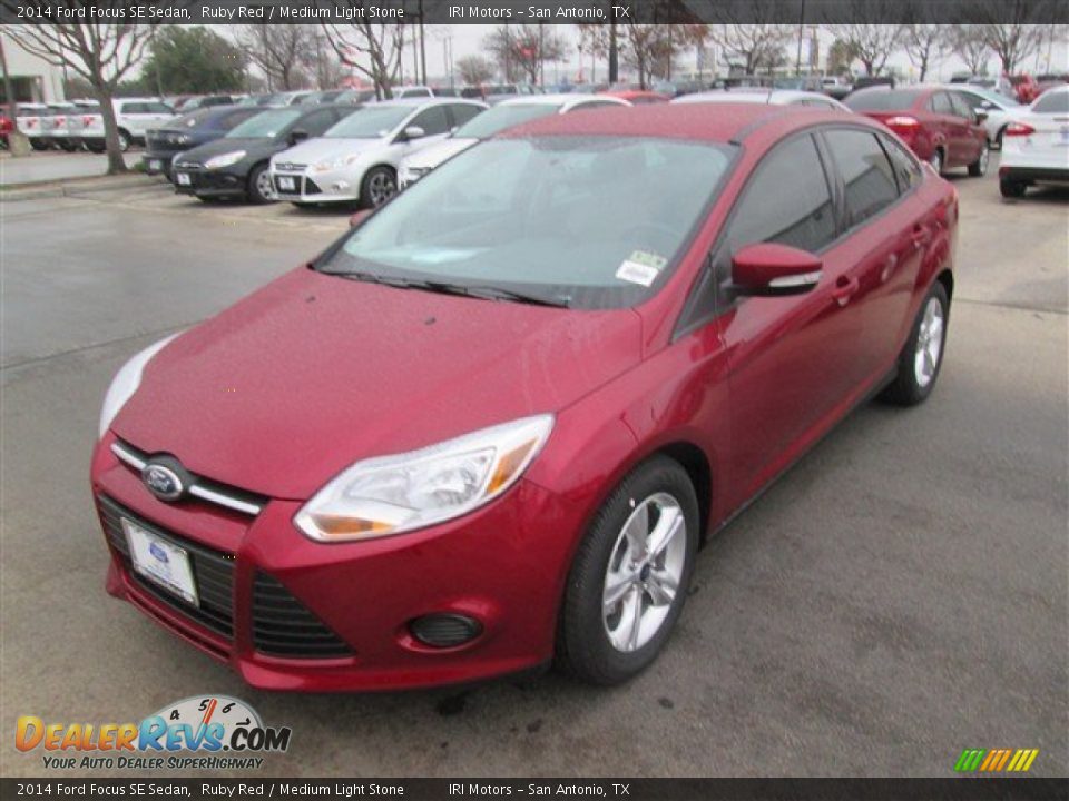 2014 Ford Focus SE Sedan Ruby Red / Medium Light Stone Photo #2