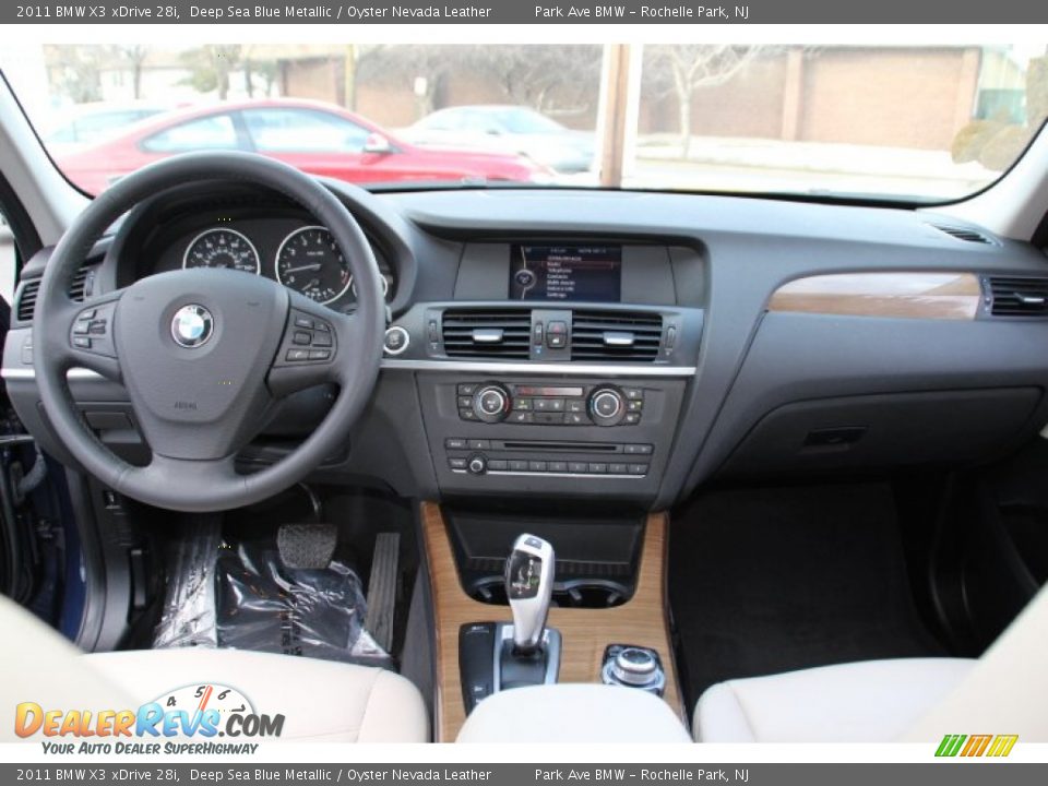 Dashboard of 2011 BMW X3 xDrive 28i Photo #12