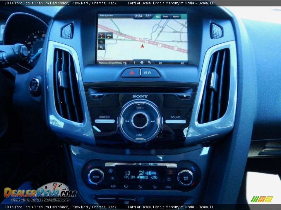 2014 Ford Focus Titanium Hatchback Ruby Red / Charcoal Black Photo #11