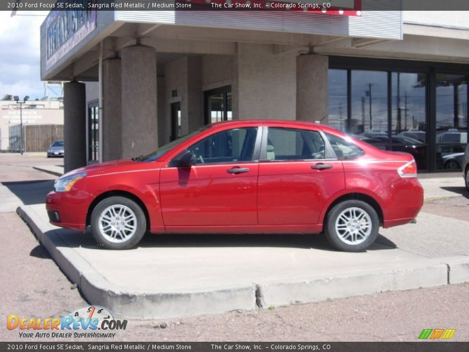 2010 Ford Focus SE Sedan Sangria Red Metallic / Medium Stone Photo #10