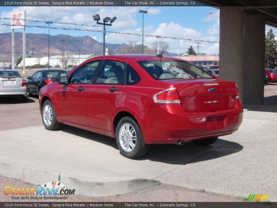 2010 Ford Focus SE Sedan Sangria Red Metallic / Medium Stone Photo #11