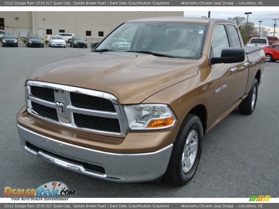 2012 Dodge Ram 1500 SLT Quad Cab Saddle Brown Pearl / Dark Slate Gray/Medium Graystone Photo #1