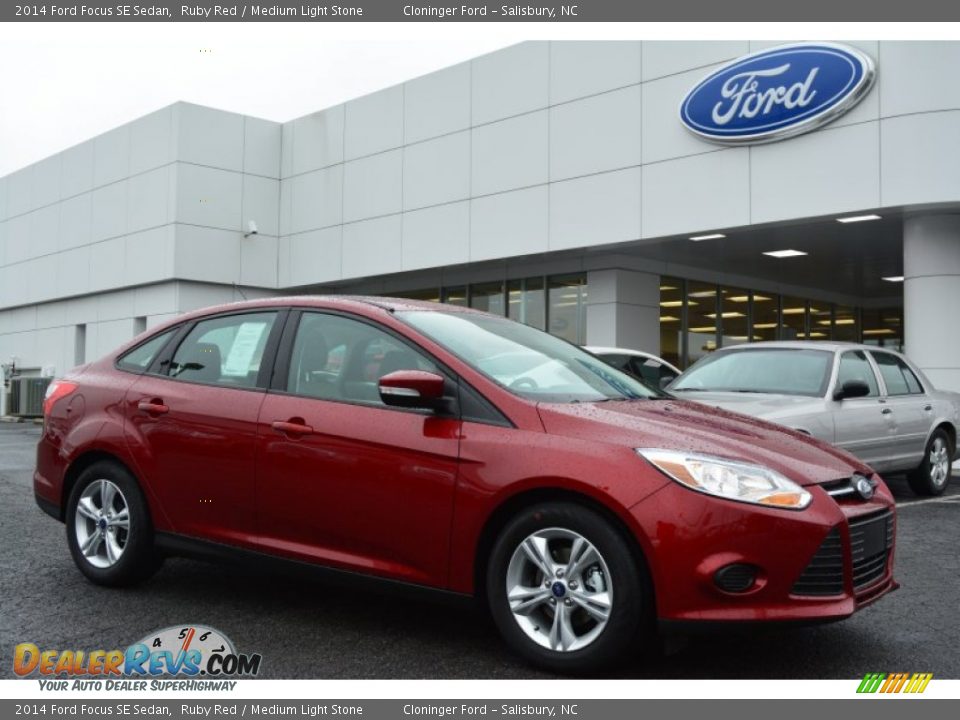 2014 Ford Focus SE Sedan Ruby Red / Medium Light Stone Photo #1