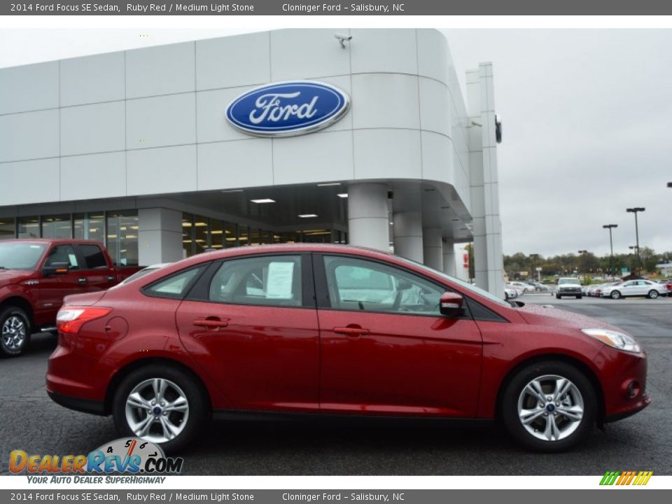 2014 Ford Focus SE Sedan Ruby Red / Medium Light Stone Photo #2