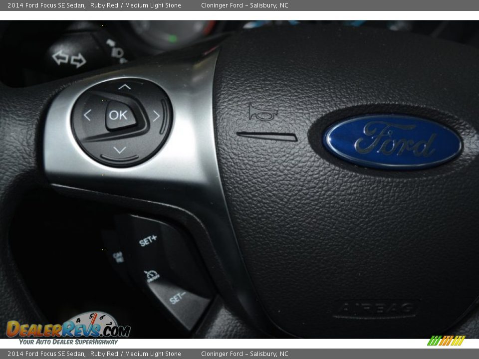 2014 Ford Focus SE Sedan Ruby Red / Medium Light Stone Photo #16
