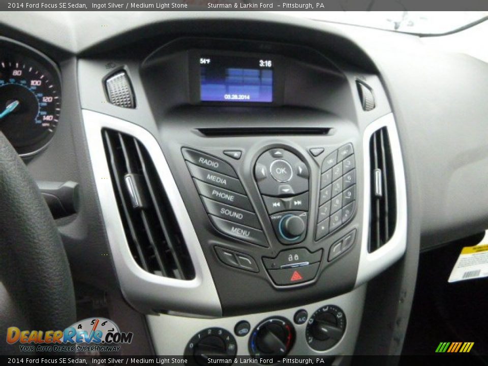 2014 Ford Focus SE Sedan Ingot Silver / Medium Light Stone Photo #13