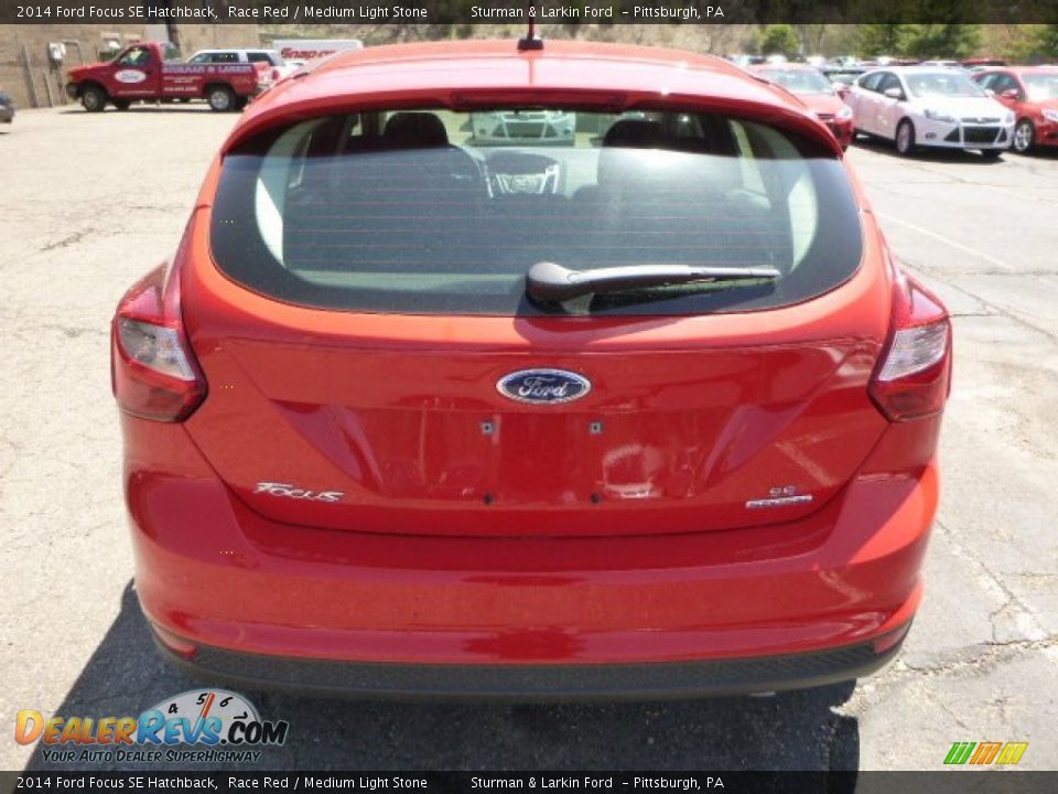 2014 Ford Focus SE Hatchback Race Red / Medium Light Stone Photo #3