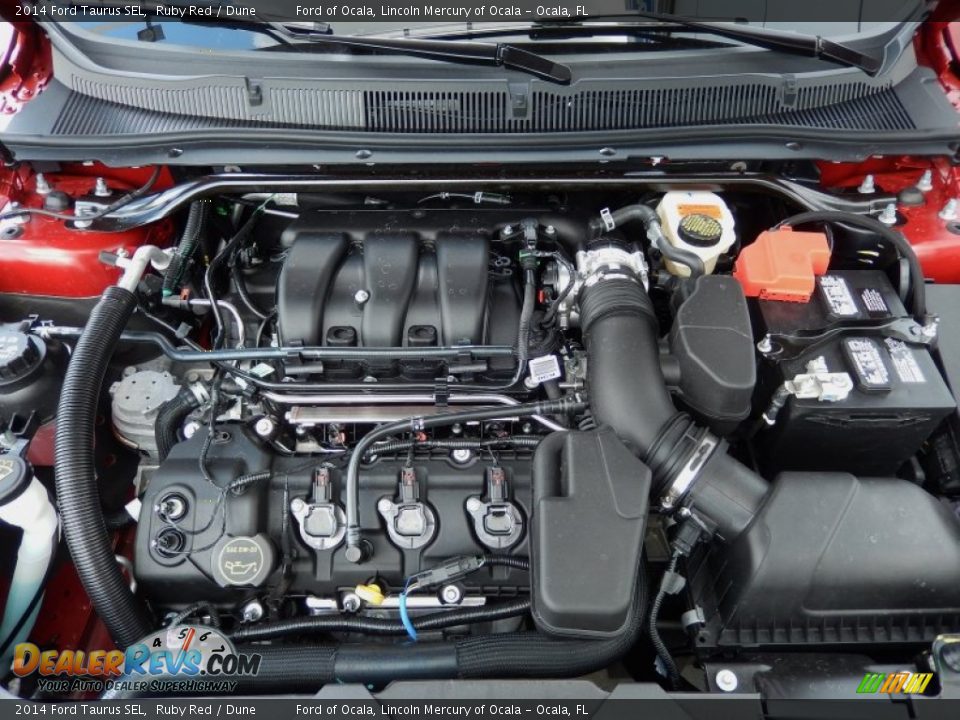 2014 Ford Taurus SEL Ruby Red / Dune Photo #11
