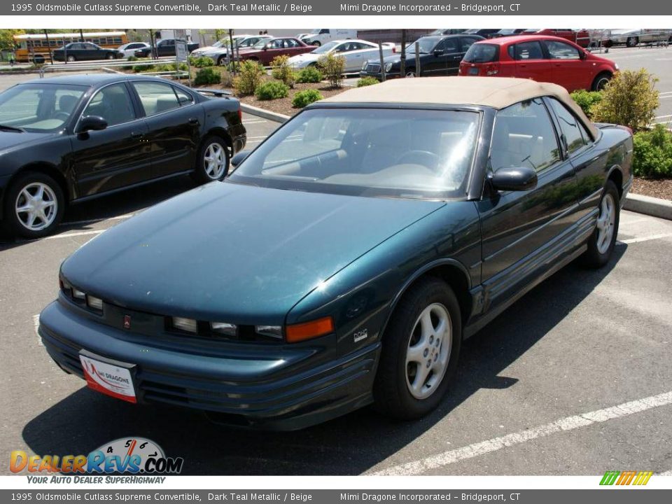1995 Oldsmobile Cutlass Supreme Convertible Dark Teal Metallic / Beige Photo #1