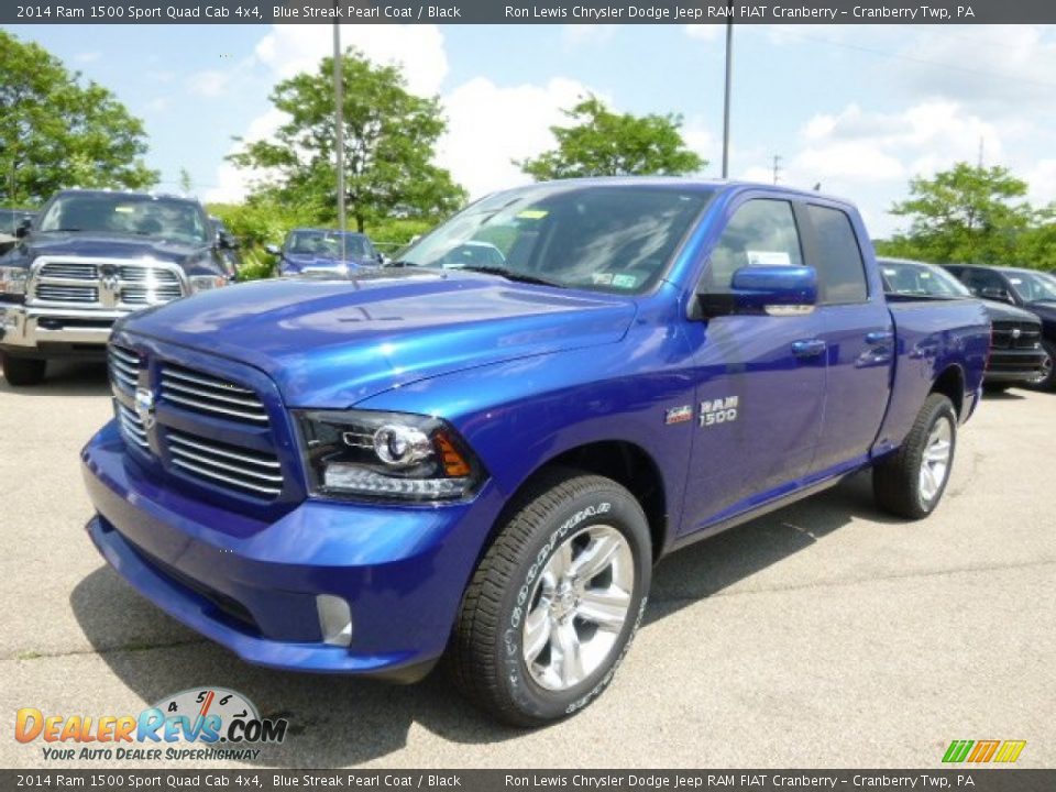 Front 3/4 View of 2014 Ram 1500 Sport Quad Cab 4x4 Photo #2