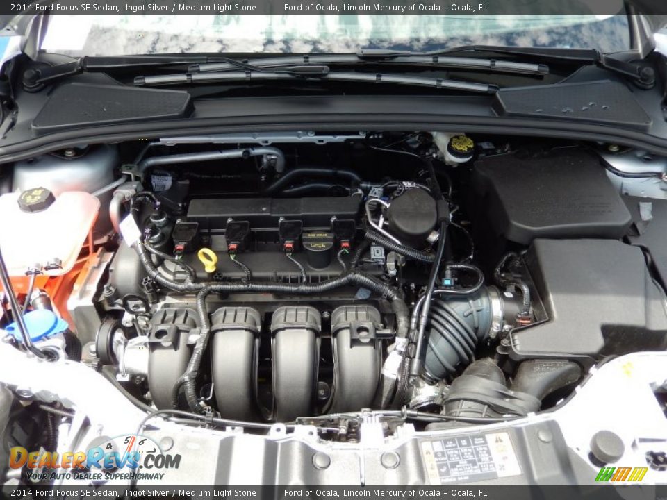 2014 Ford Focus SE Sedan Ingot Silver / Medium Light Stone Photo #11