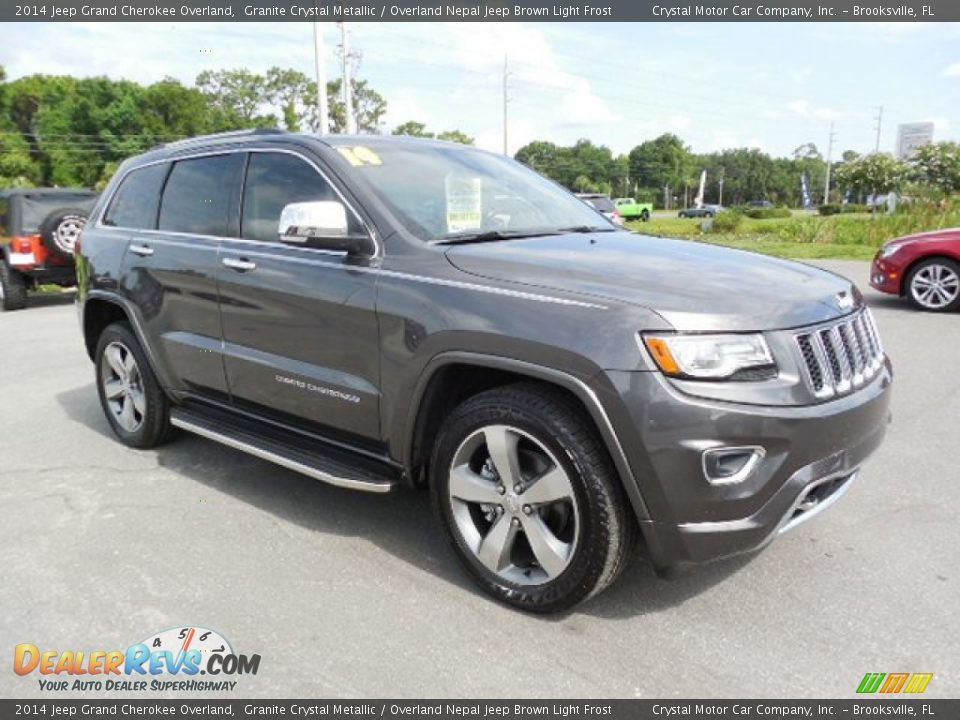 Front 3/4 View of 2014 Jeep Grand Cherokee Overland Photo #11