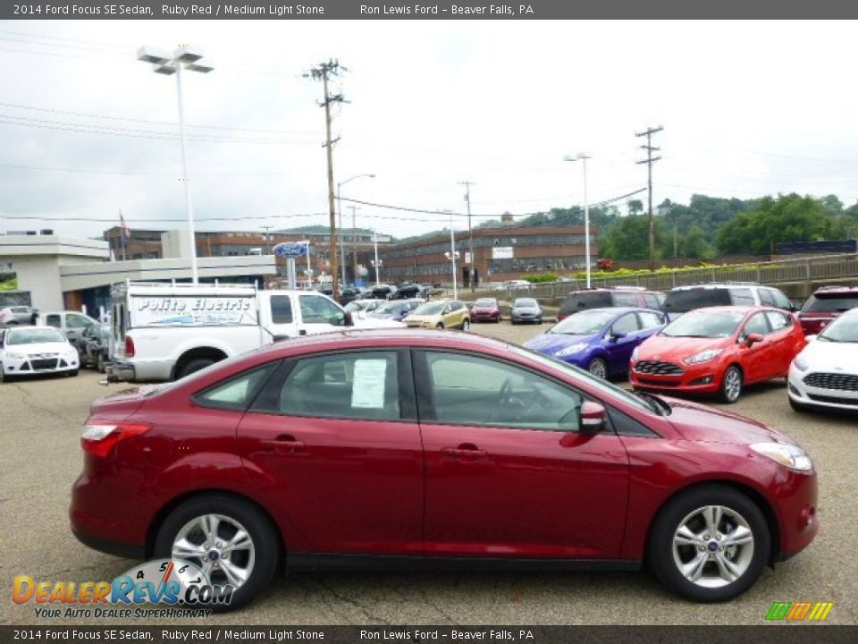2014 Ford Focus SE Sedan Ruby Red / Medium Light Stone Photo #1