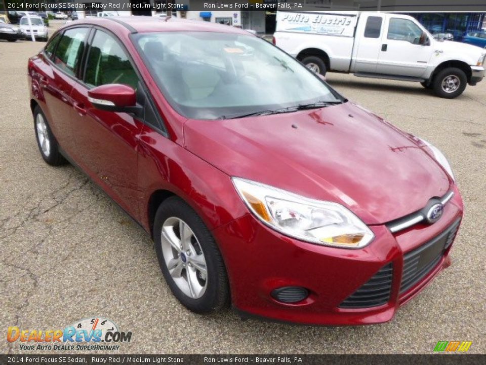 2014 Ford Focus SE Sedan Ruby Red / Medium Light Stone Photo #2