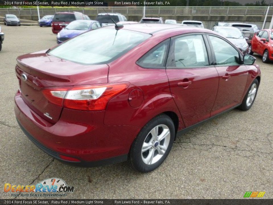 2014 Ford Focus SE Sedan Ruby Red / Medium Light Stone Photo #8
