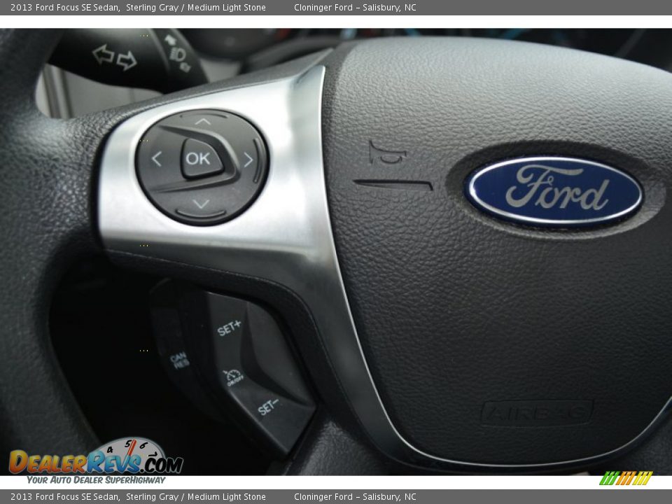 2013 Ford Focus SE Sedan Sterling Gray / Medium Light Stone Photo #23