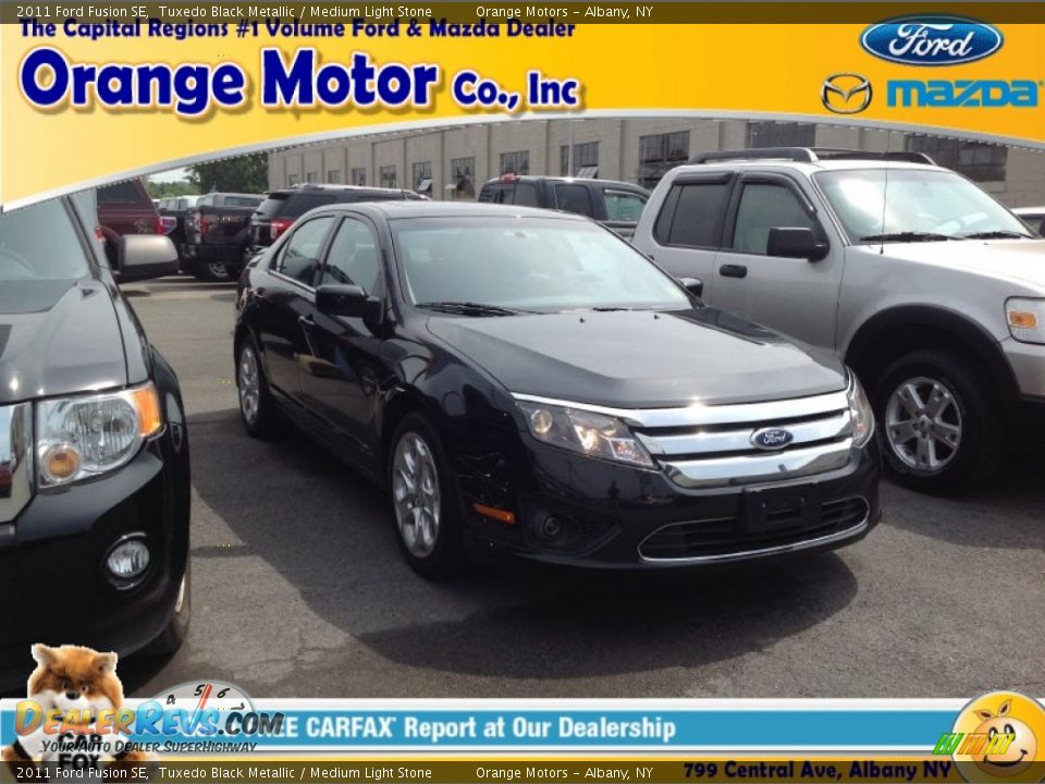 2011 Ford Fusion SE Tuxedo Black Metallic / Medium Light Stone Photo #1