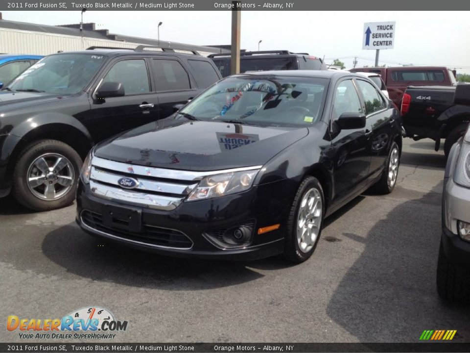 2011 Ford Fusion SE Tuxedo Black Metallic / Medium Light Stone Photo #3