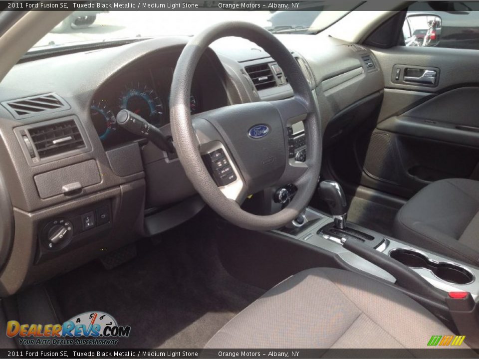 2011 Ford Fusion SE Tuxedo Black Metallic / Medium Light Stone Photo #5