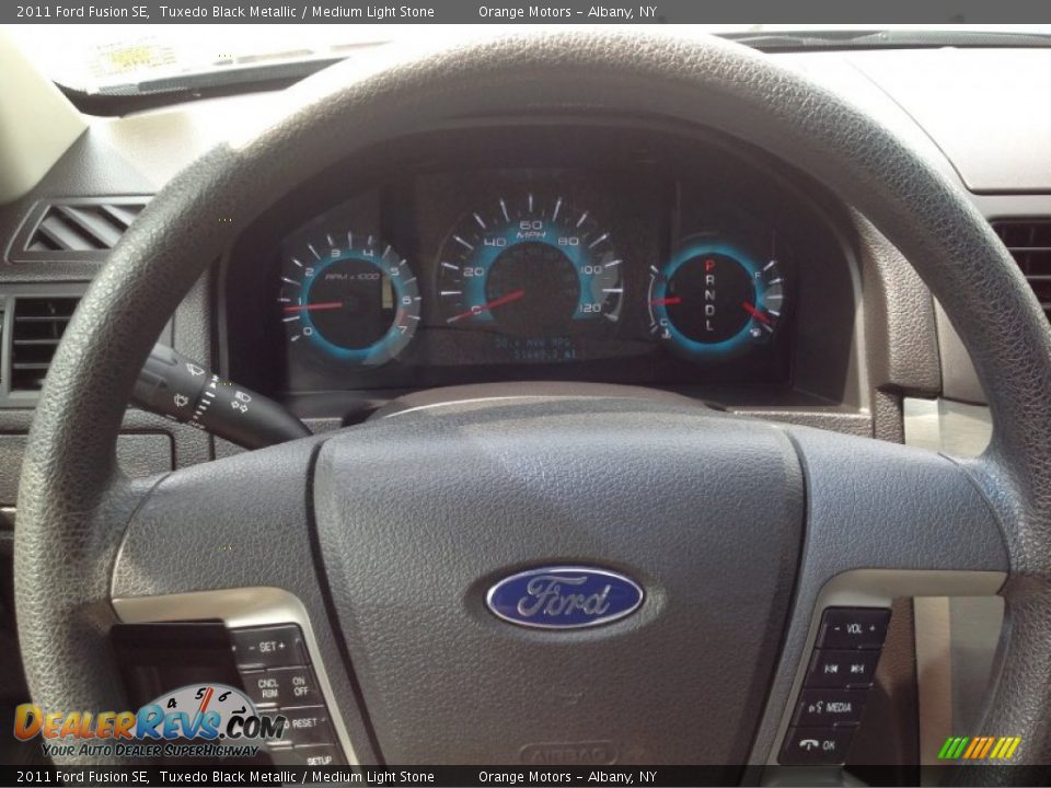 2011 Ford Fusion SE Tuxedo Black Metallic / Medium Light Stone Photo #7