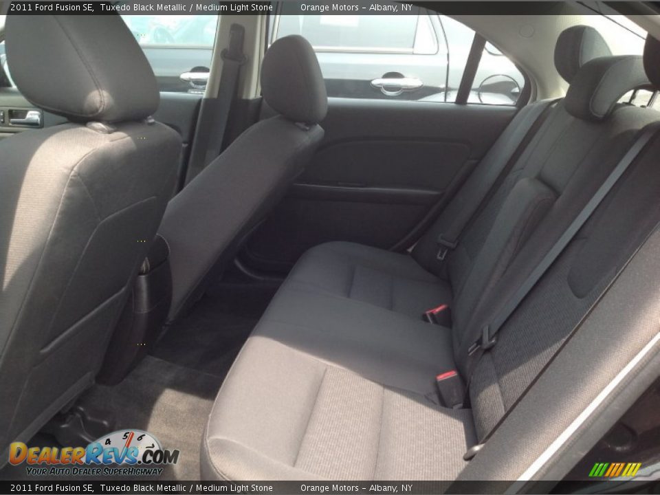 2011 Ford Fusion SE Tuxedo Black Metallic / Medium Light Stone Photo #12