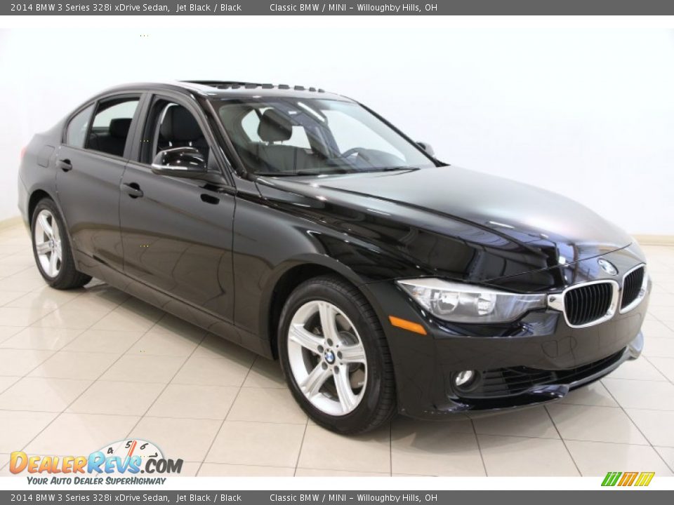 Front 3/4 View of 2014 BMW 3 Series 328i xDrive Sedan Photo #1