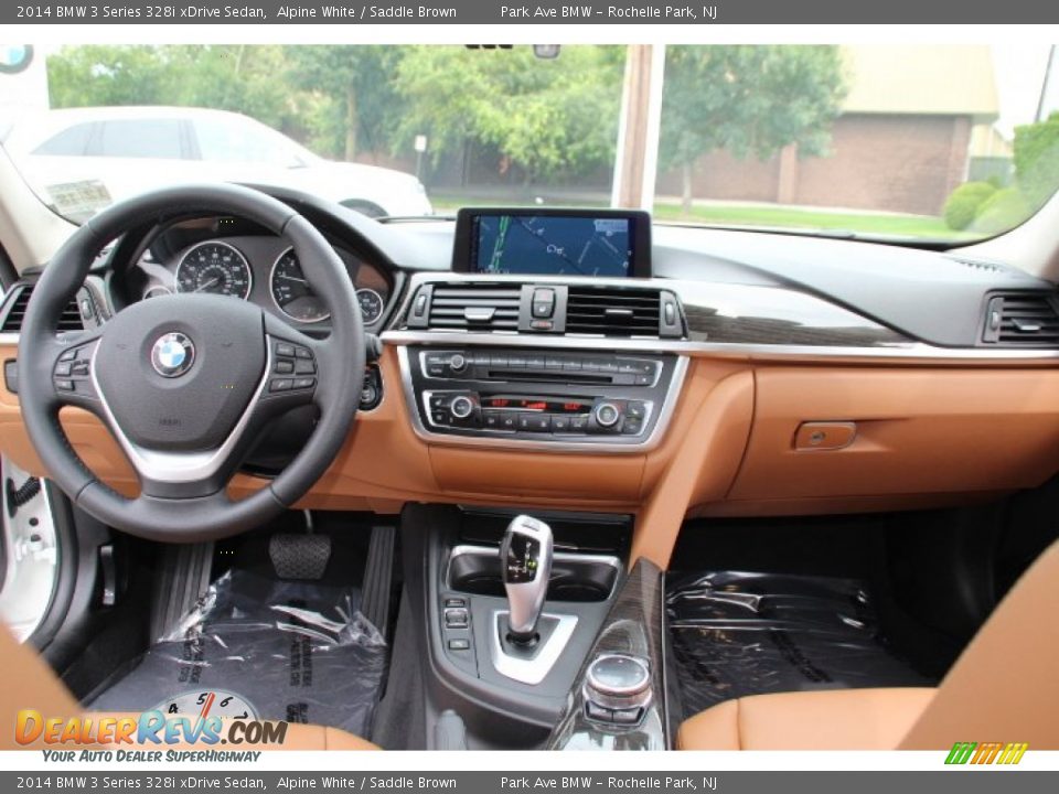 Dashboard of 2014 BMW 3 Series 328i xDrive Sedan Photo #14