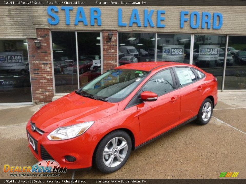 2014 Ford Focus SE Sedan Race Red / Charcoal Black Photo #1