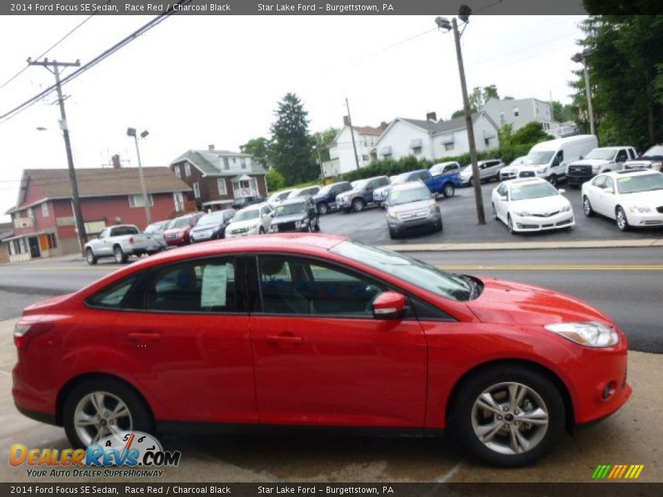 2014 Ford Focus SE Sedan Race Red / Charcoal Black Photo #4