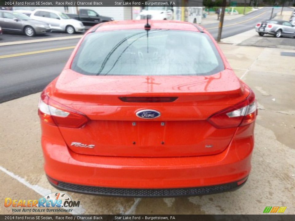 2014 Ford Focus SE Sedan Race Red / Charcoal Black Photo #6