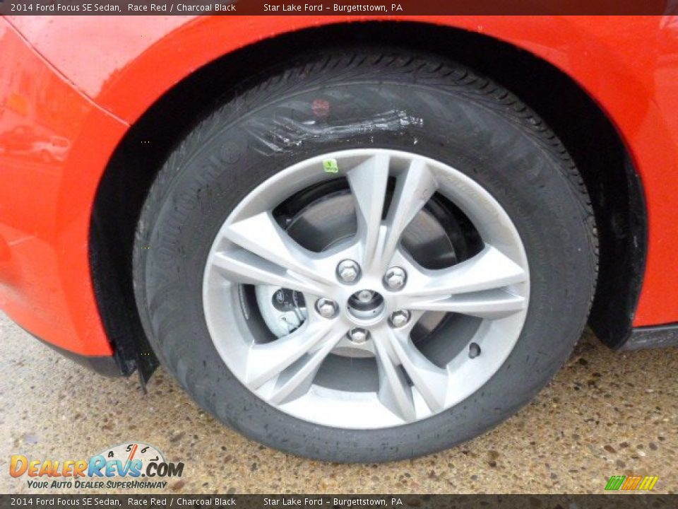 2014 Ford Focus SE Sedan Race Red / Charcoal Black Photo #9