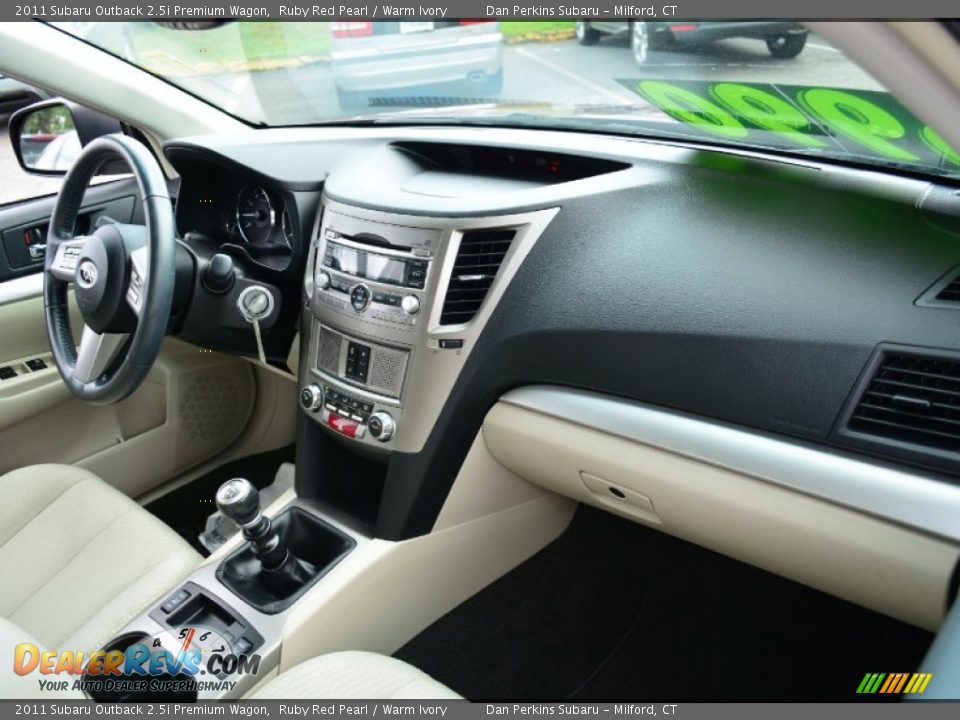 Dashboard of 2011 Subaru Outback 2.5i Premium Wagon Photo #13