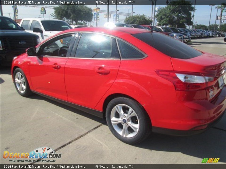 2014 Ford Focus SE Sedan Race Red / Medium Light Stone Photo #2