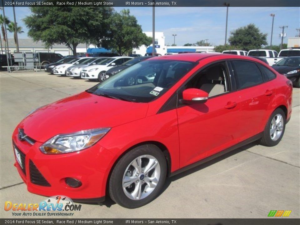 2014 Ford Focus SE Sedan Race Red / Medium Light Stone Photo #3