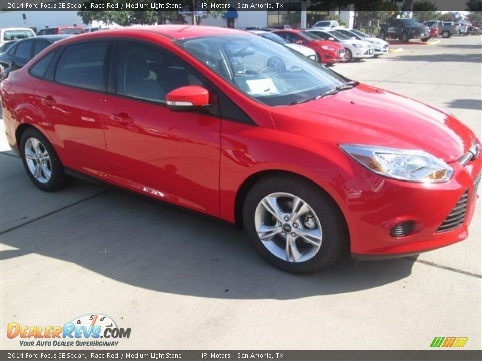 2014 Ford Focus SE Sedan Race Red / Medium Light Stone Photo #4