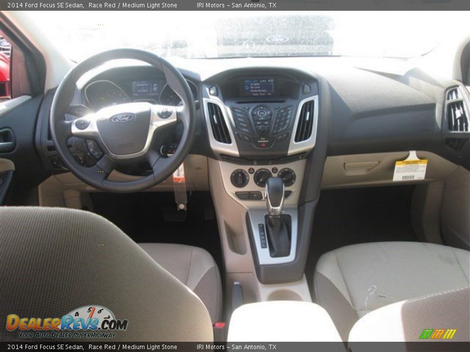 2014 Ford Focus SE Sedan Race Red / Medium Light Stone Photo #6