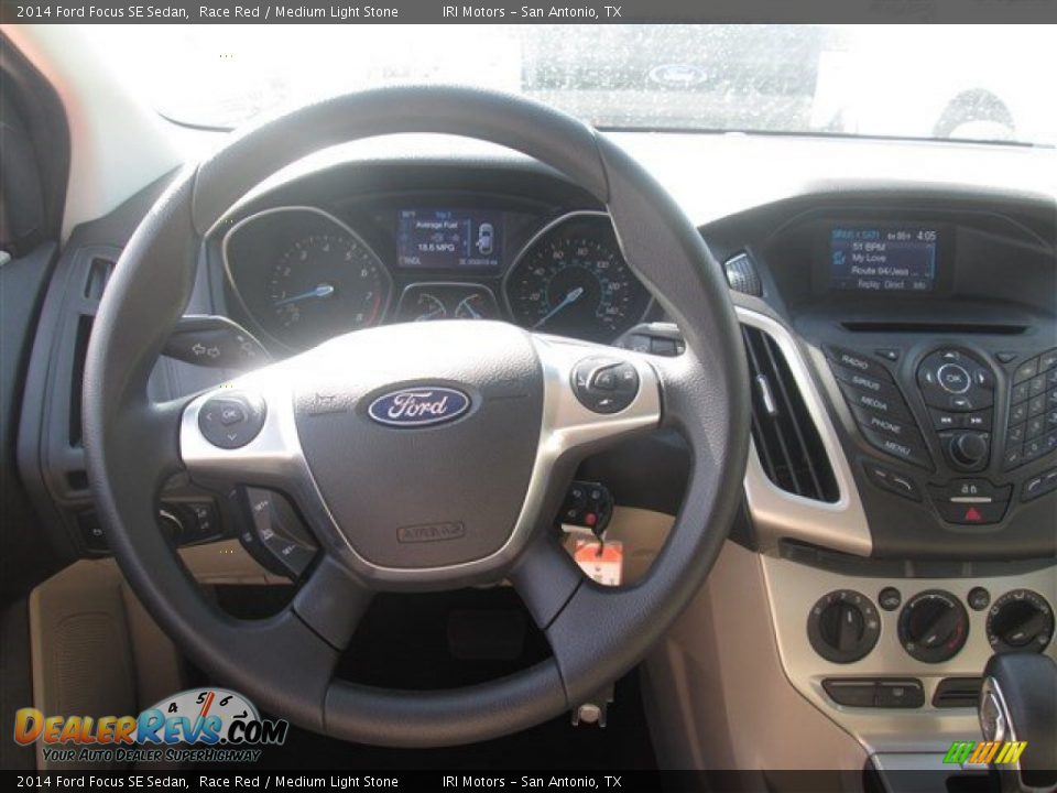 2014 Ford Focus SE Sedan Race Red / Medium Light Stone Photo #7