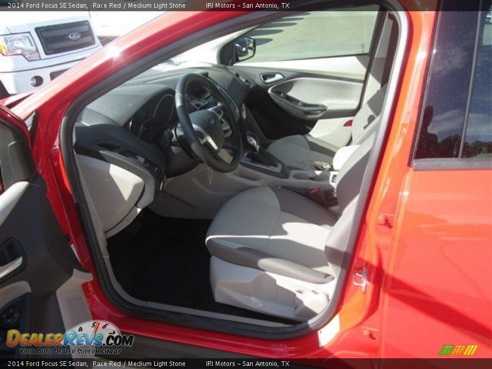 2014 Ford Focus SE Sedan Race Red / Medium Light Stone Photo #8