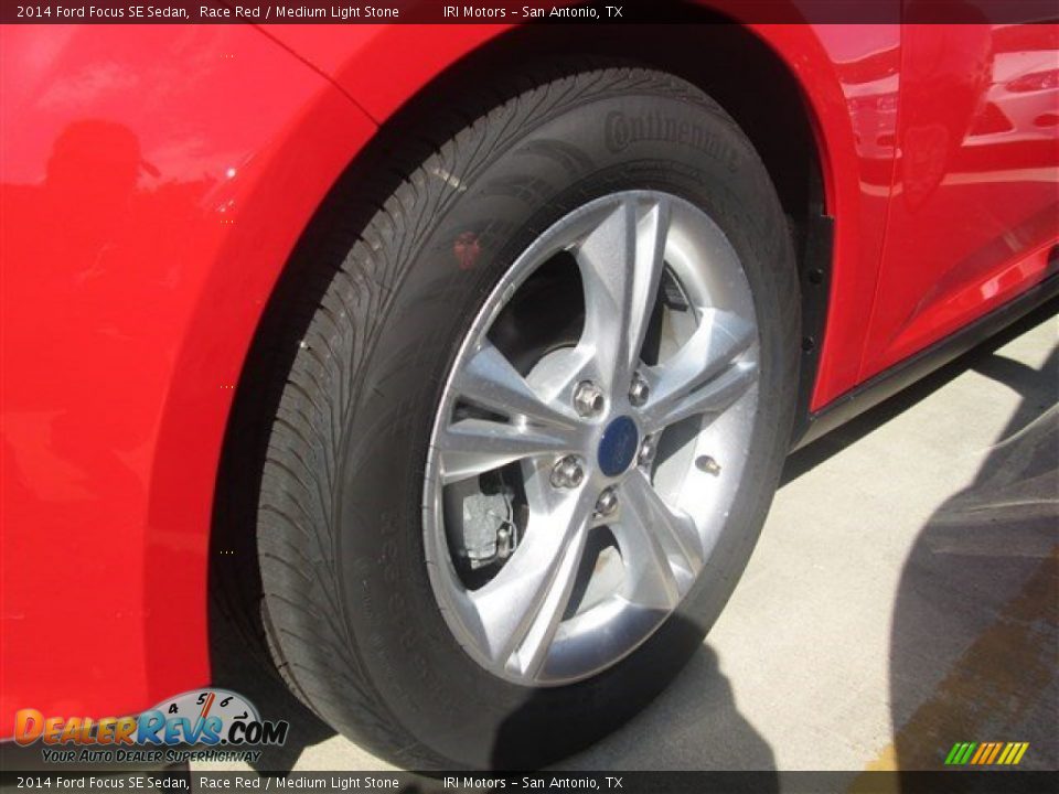2014 Ford Focus SE Sedan Race Red / Medium Light Stone Photo #9