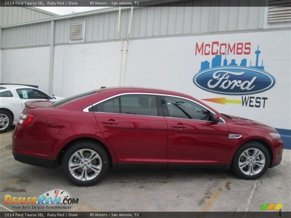 2014 Ford Taurus SEL Ruby Red / Dune Photo #1